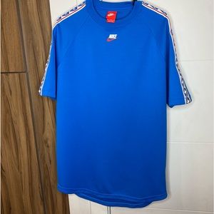 Nike Blue Short Sleeve Jersey Mens Medium to Large Big logo ribbon logo sleeves